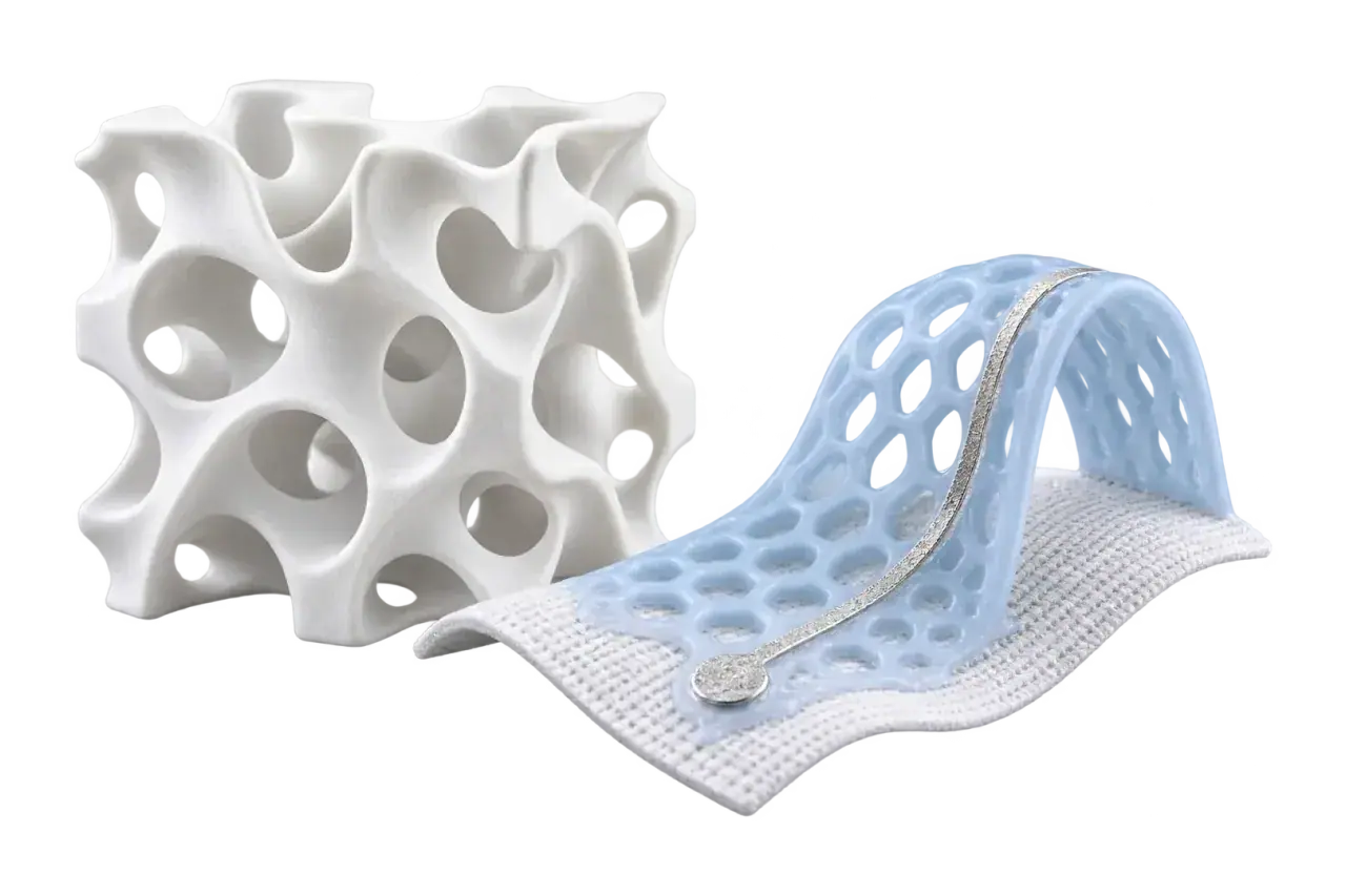Concept illustration of a white lattice component and a flexible printed structure on fabric